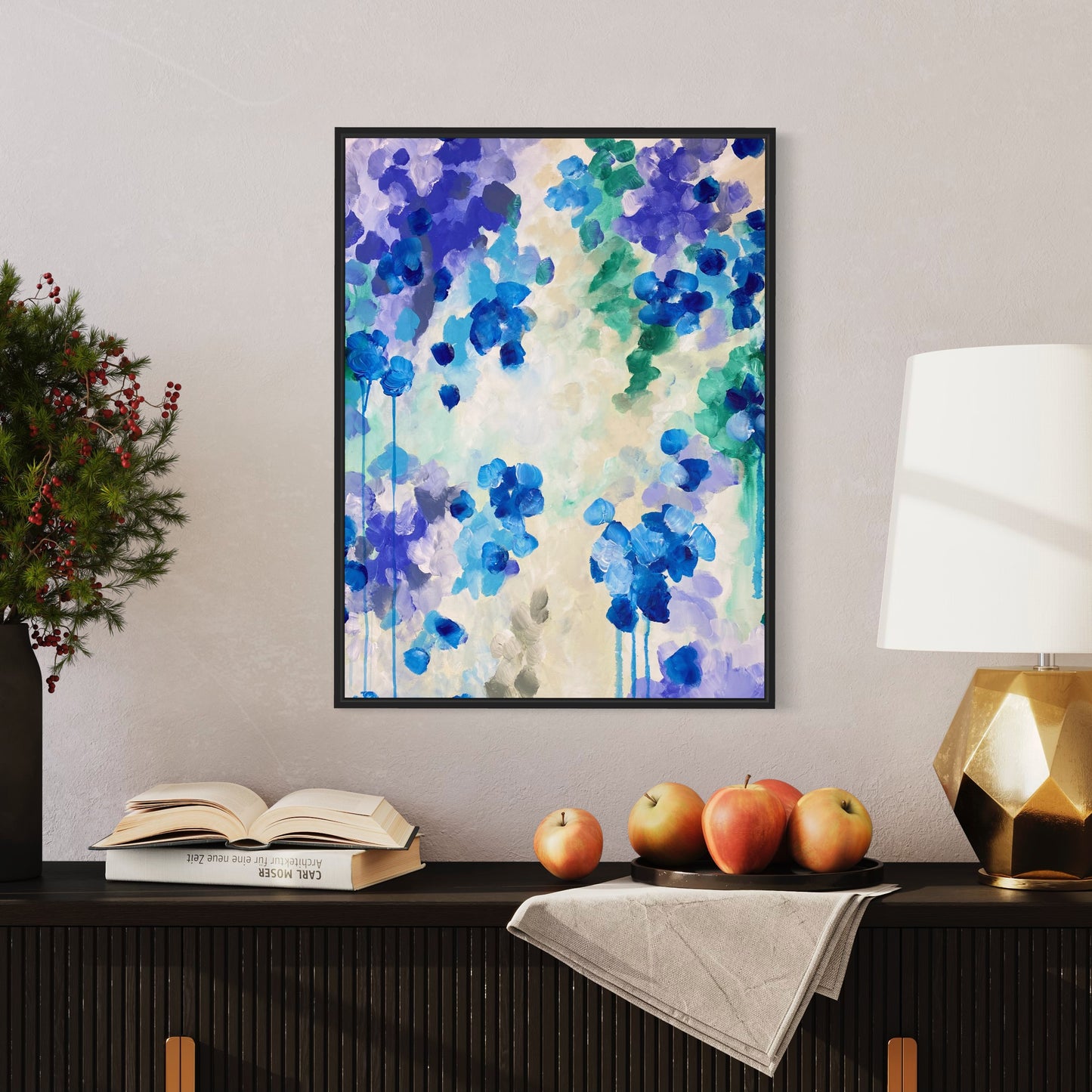 abstract art painting blue coulors on a wall with black frame