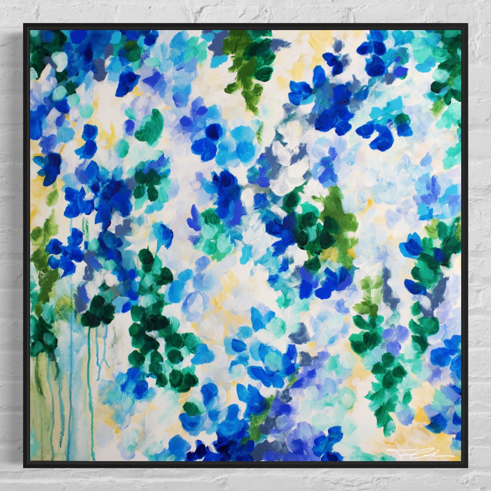 mockup abstract painting on a wall flower motives blue black frame