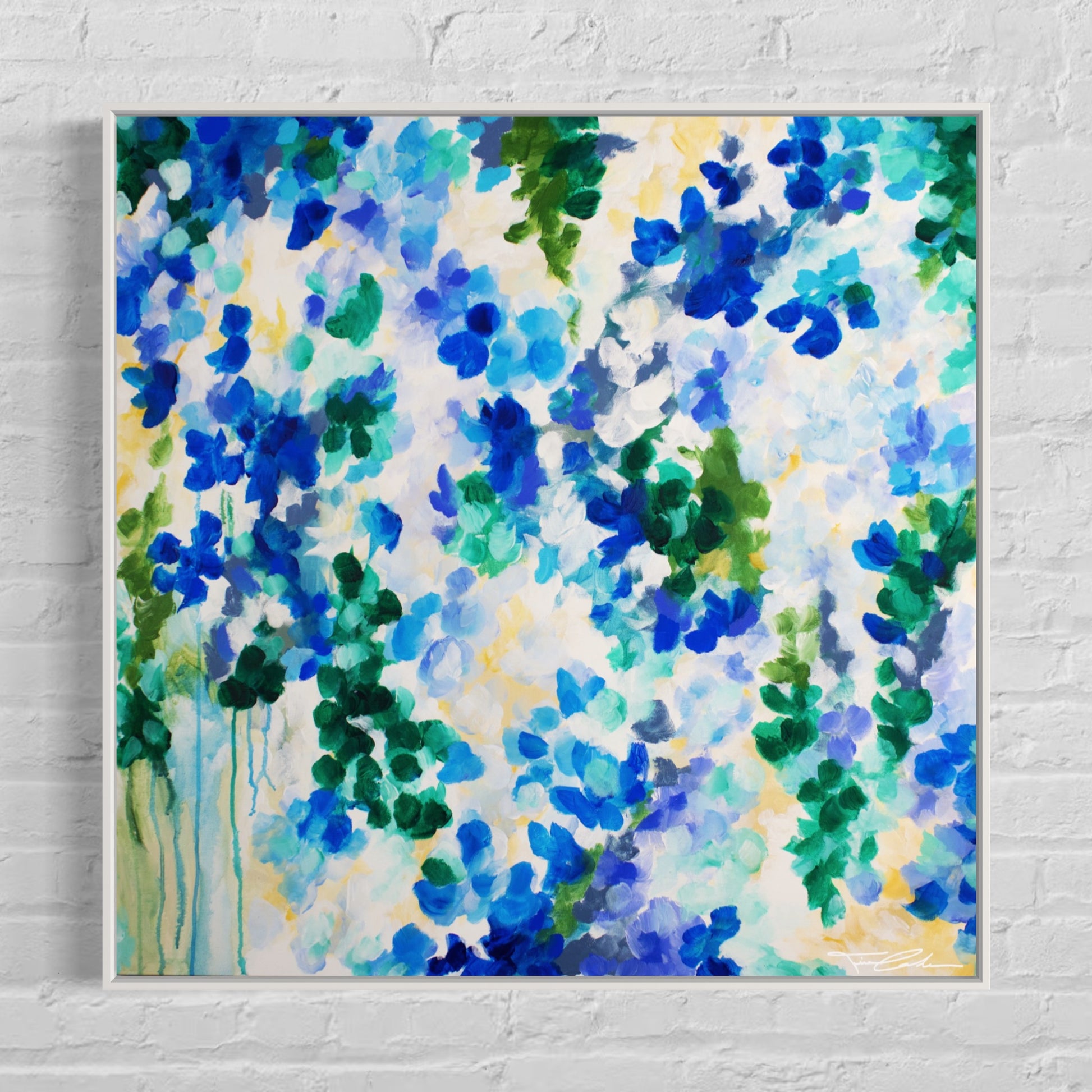 mockup abstract painting on a wall flower motives blue white frame