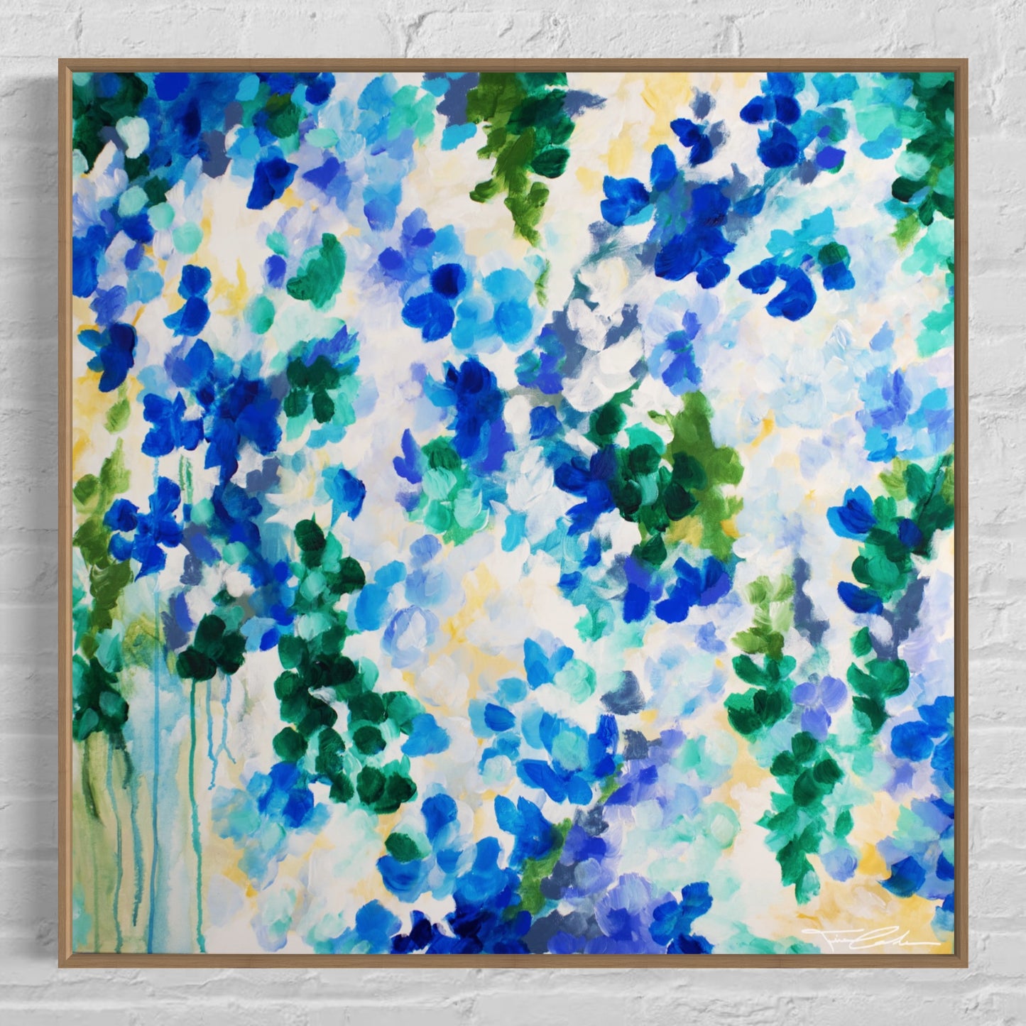 mockup abstract painting on a wall flower motives blue wood frame