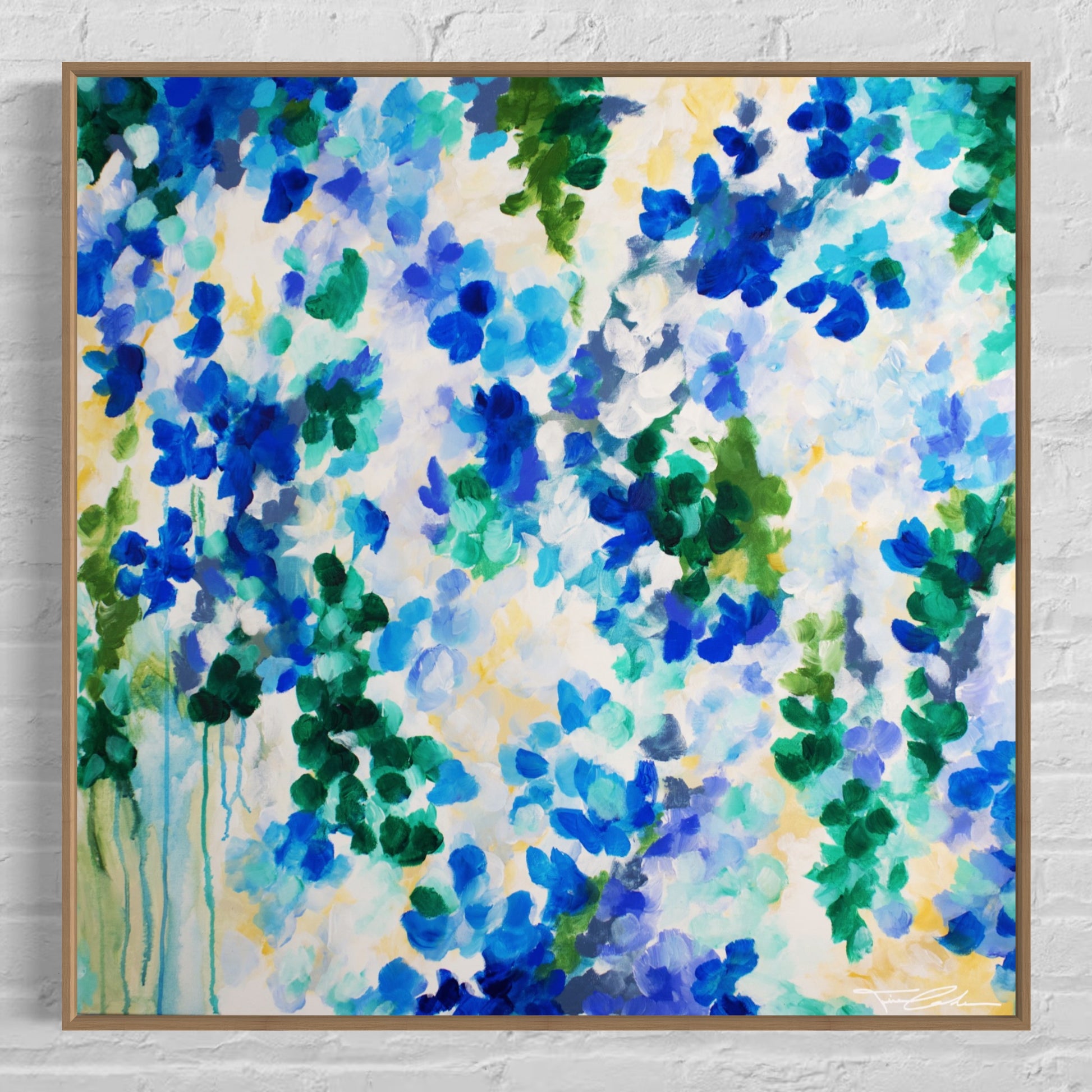 mockup abstract painting on a wall flower motives blue wood frame