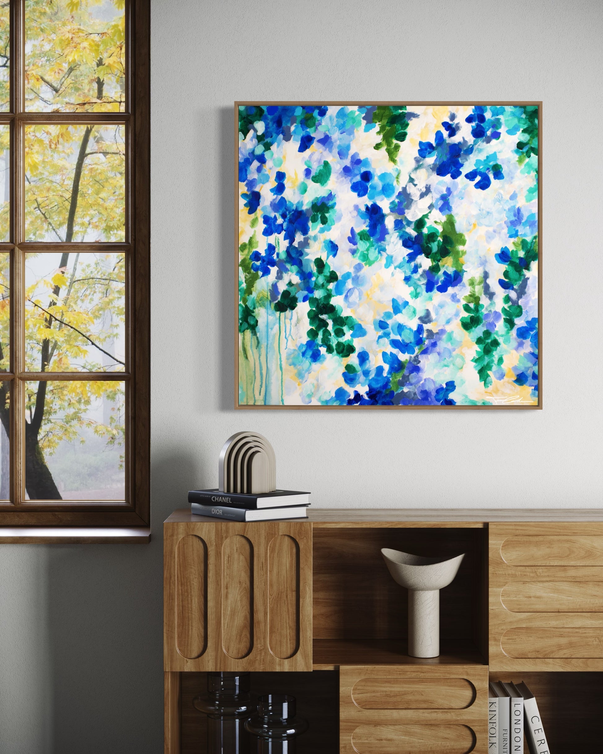 mockup abstract painting on a wall flower motives blue wood frame