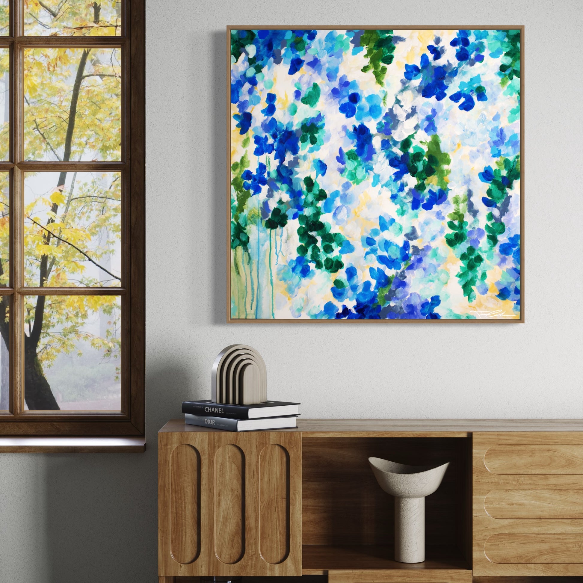 mockup abstract painting on a wall flower motives blue wood frame living room