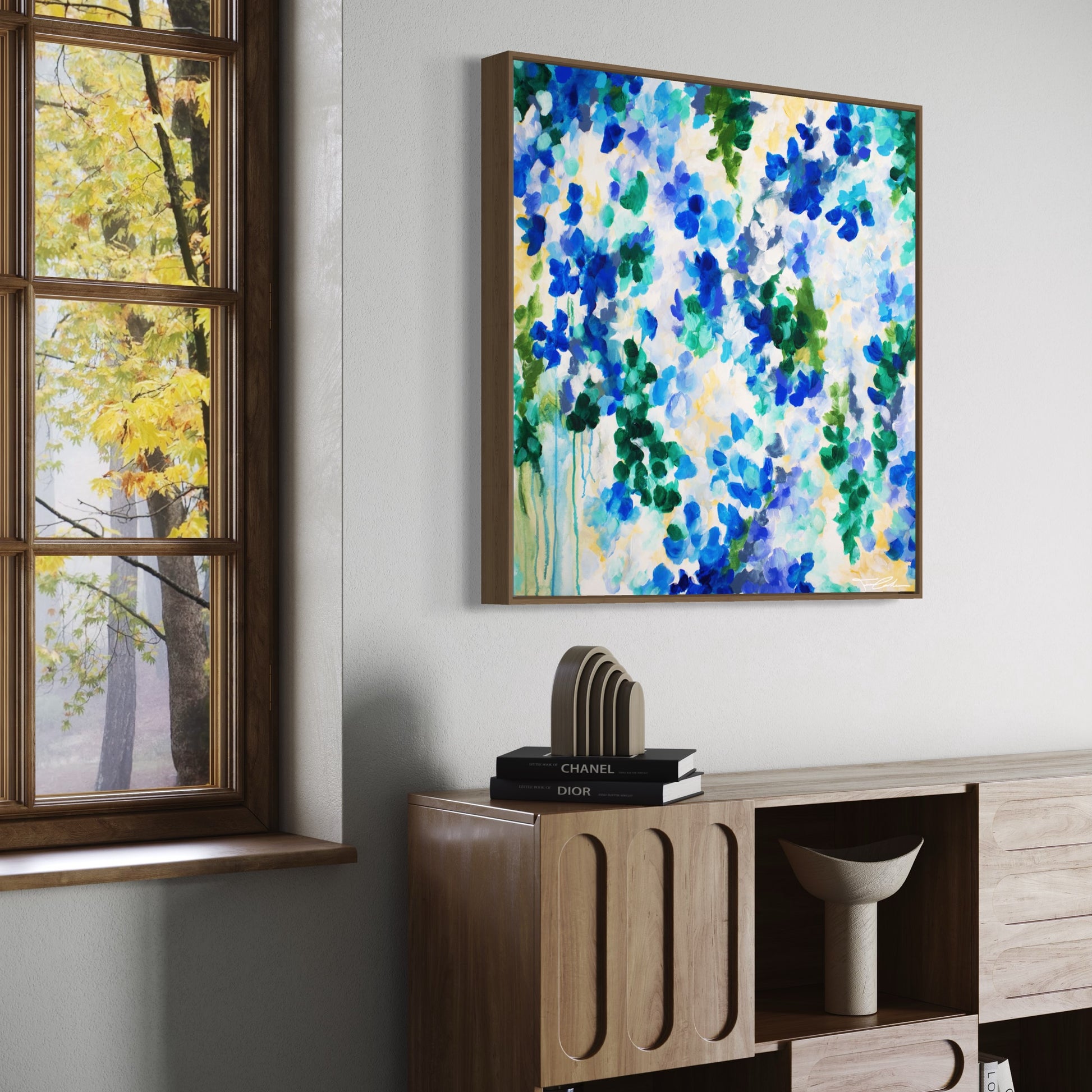 mockup abstract painting on a wall flower motives blue wood frame