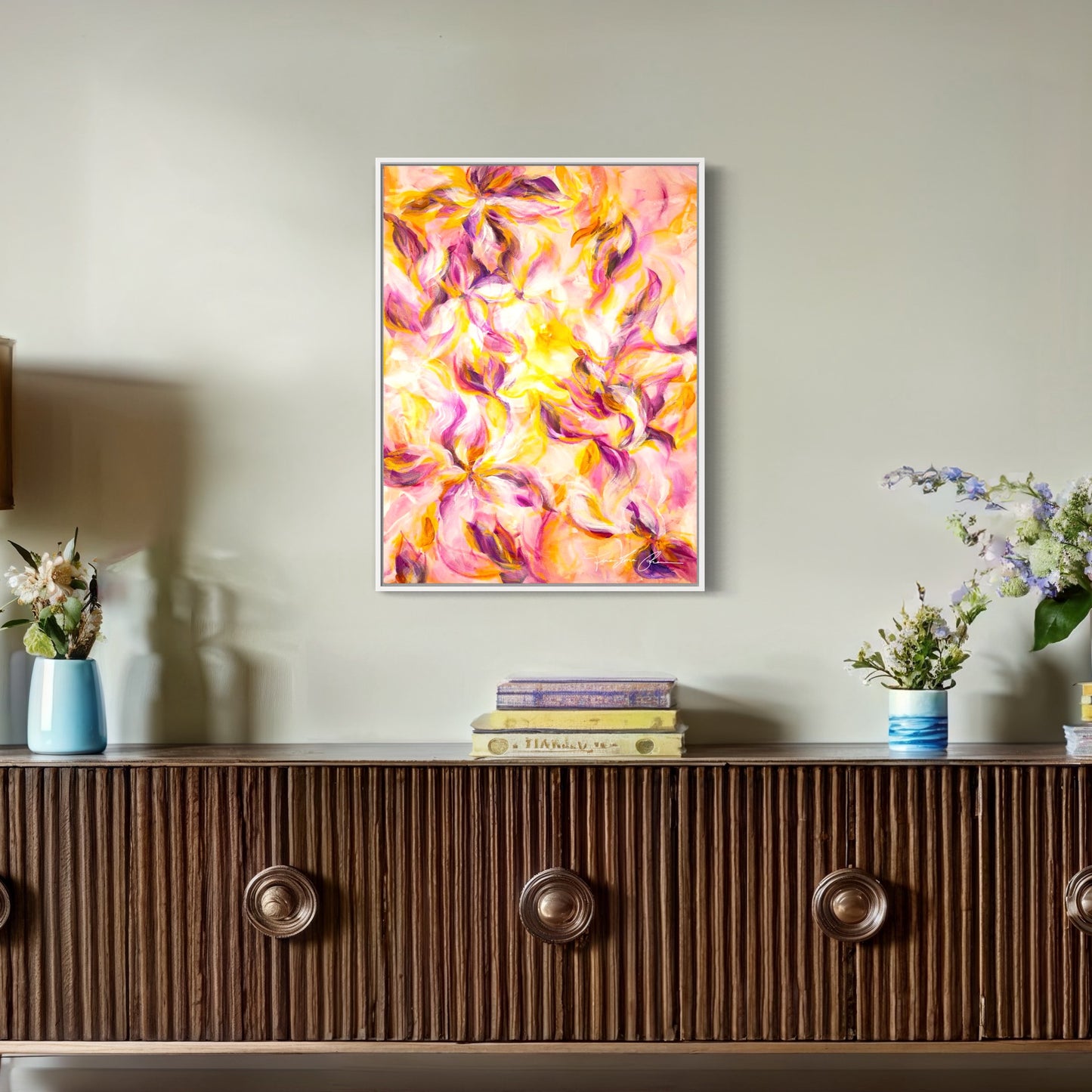 mockup abstract painting on a wall flower motives pink and yellow white frame