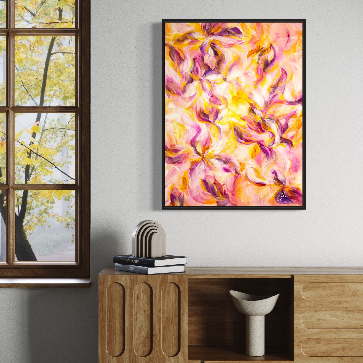 mockup abstract painting on a wall flower motives pink and yellow black frame