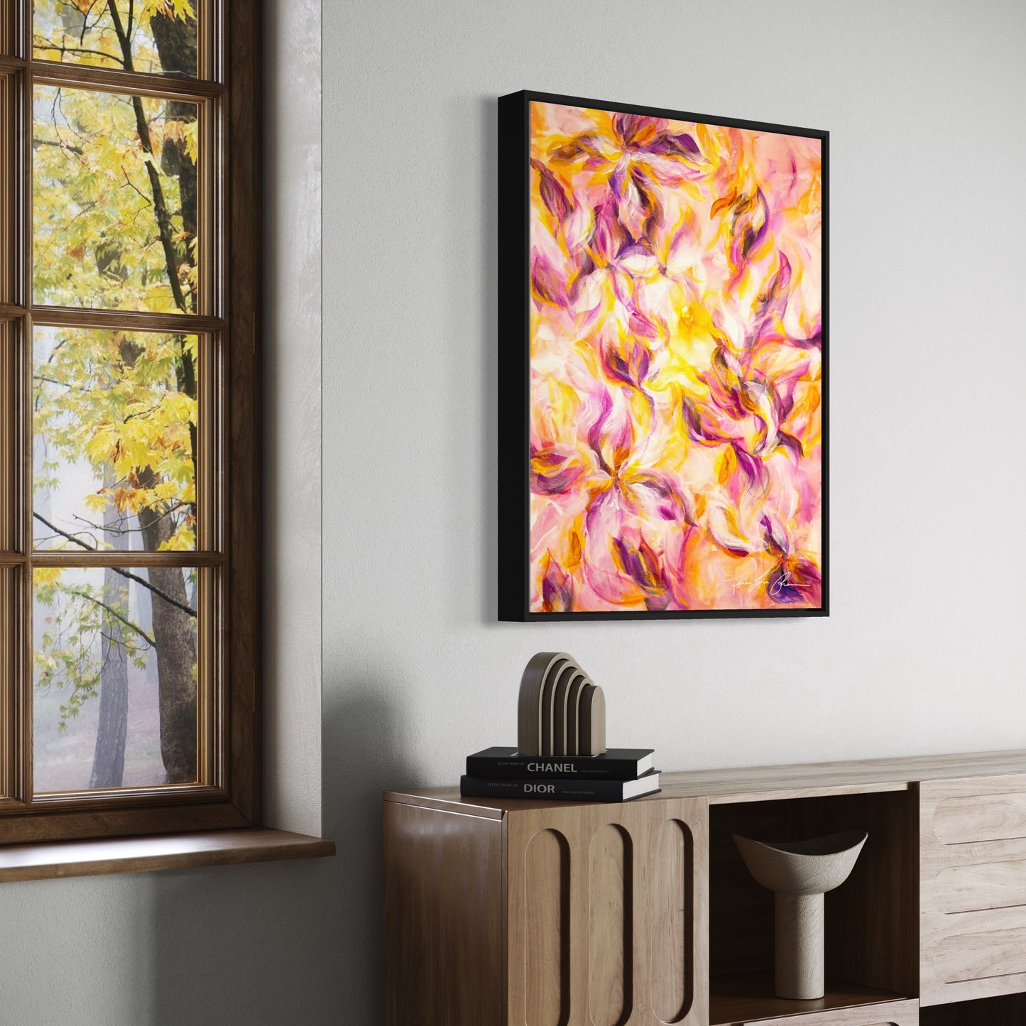 mockup abstract painting on a wall flower motives pink and yellow black frame side