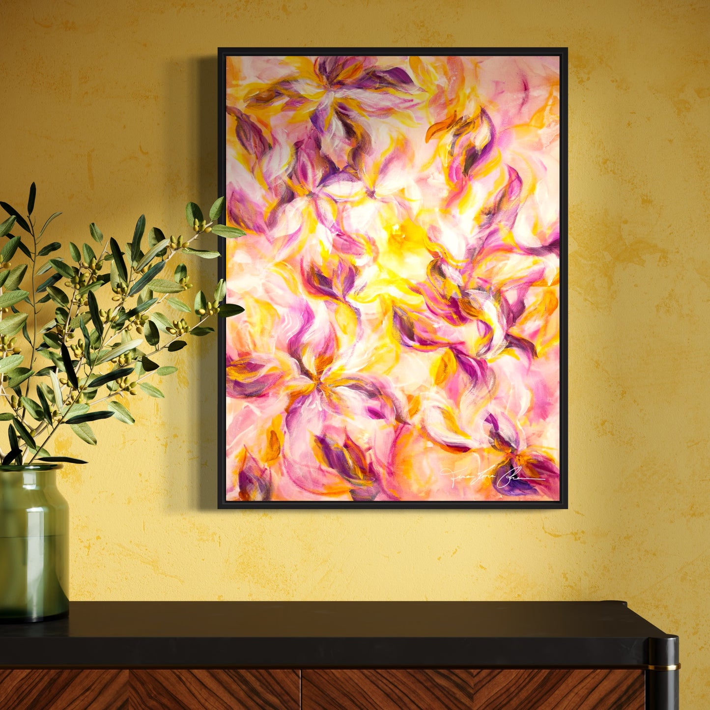 mockup abstract painting on a wall flower motives pink and yellow black frame