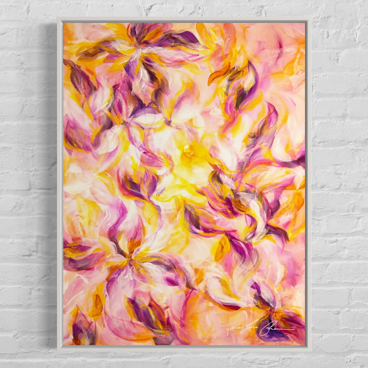 mockup abstract painting on a wall flower motives pink and yellow white frame
